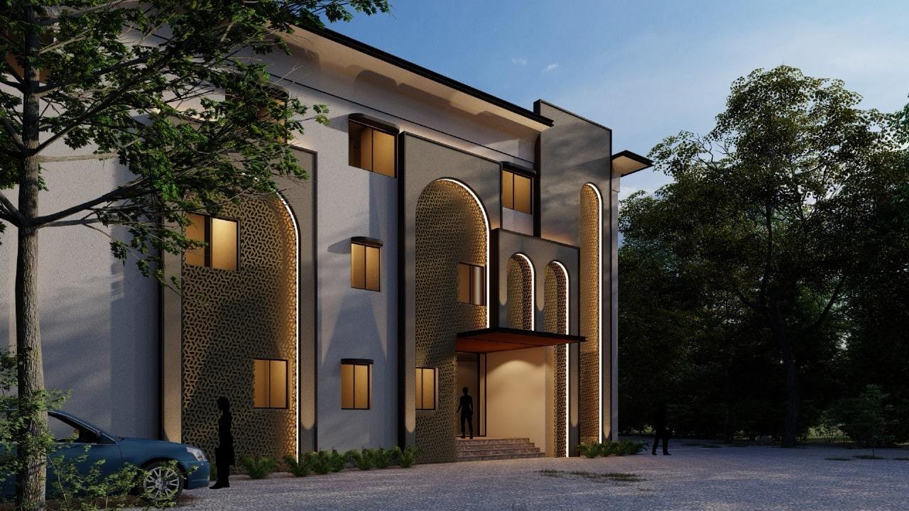 The Palasa entrance at dusk, illuminated facade among the trees